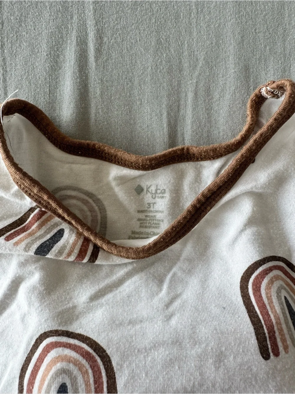 Kyte BABY Pajama Set with neutral Brown Rainbow Print
